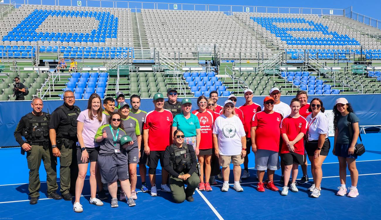 Special Olympics Florida athletes, coaches, and sheriff's deputies gathered on the blue stadium court in Delray Beach