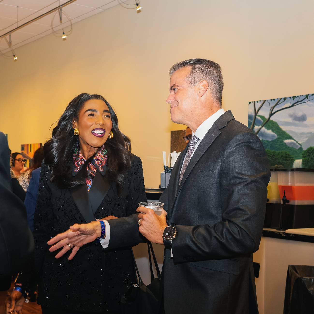 State Senator Barbara Sharief laughing with Broward County Property Appraiser Marty Kiar at the Miramar Democratic Club Leaders Who Shine Gala
