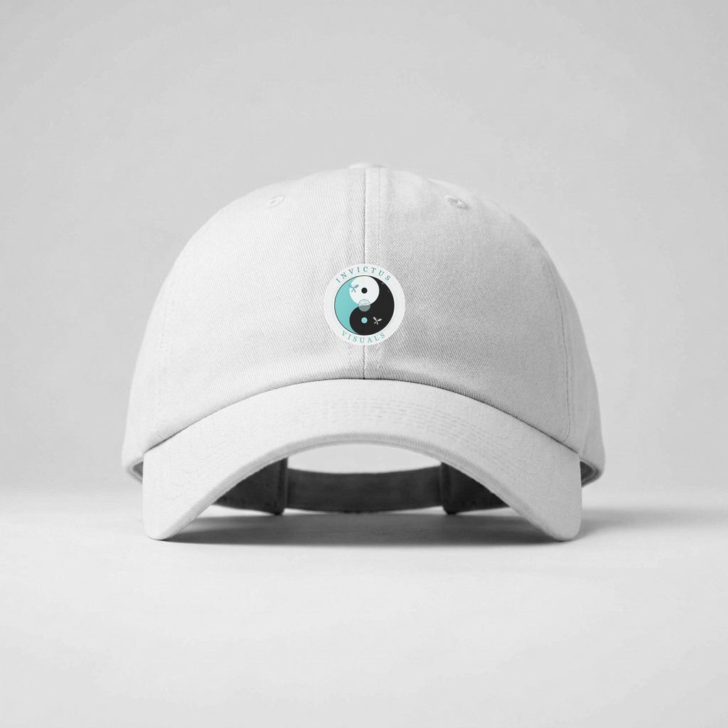 Black and white dad cap mockup with the Invictus Visuals emblem centered on the front panel