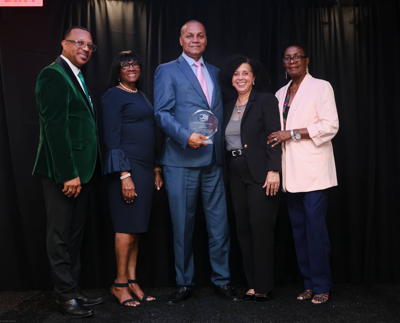 An honoree receiving an award on stage