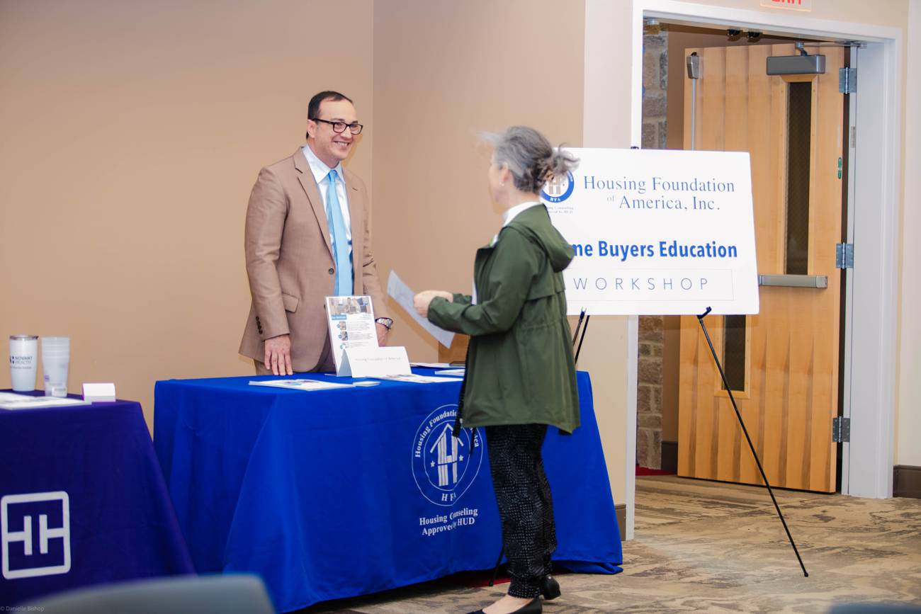 A homebuyer education workshop table for Housing Foundation of America