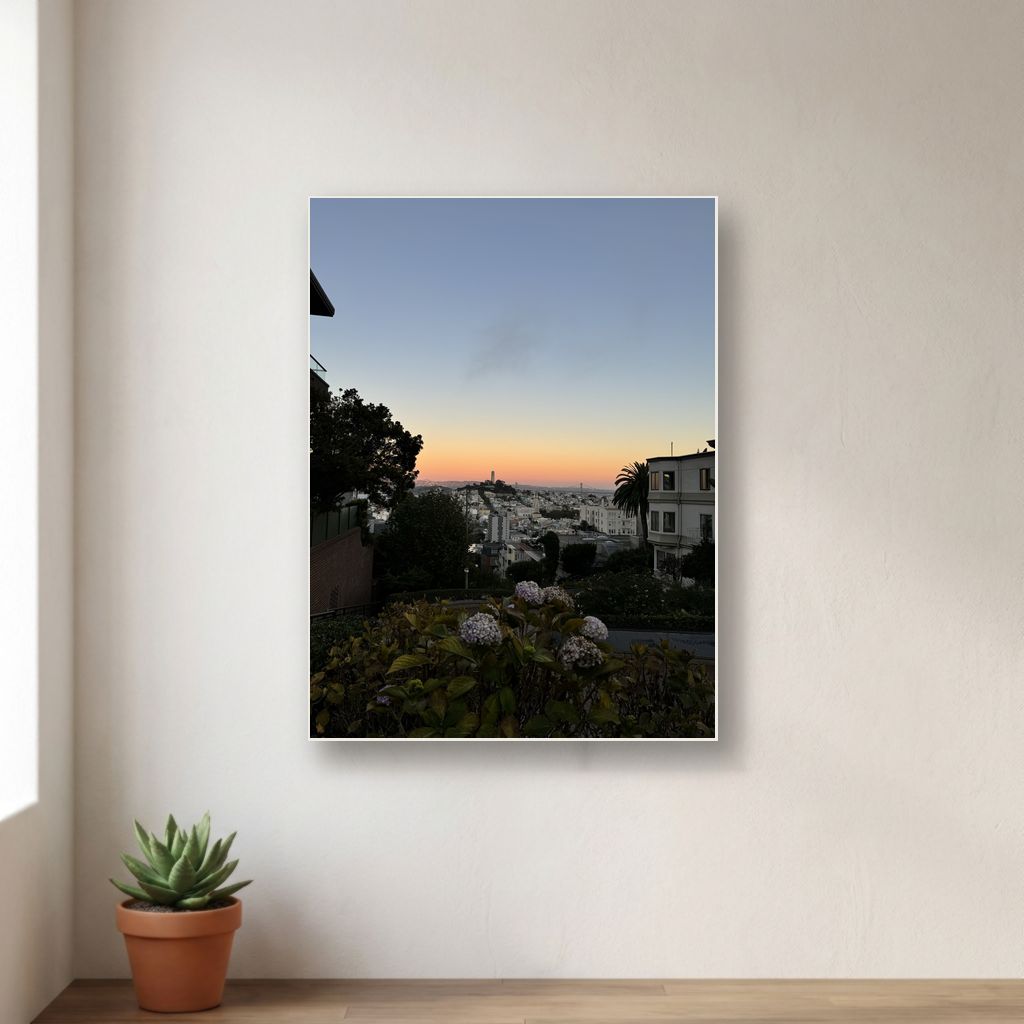 Canvas print mockup of a garden at sunset overlooking the city, hanging on a clean wall
